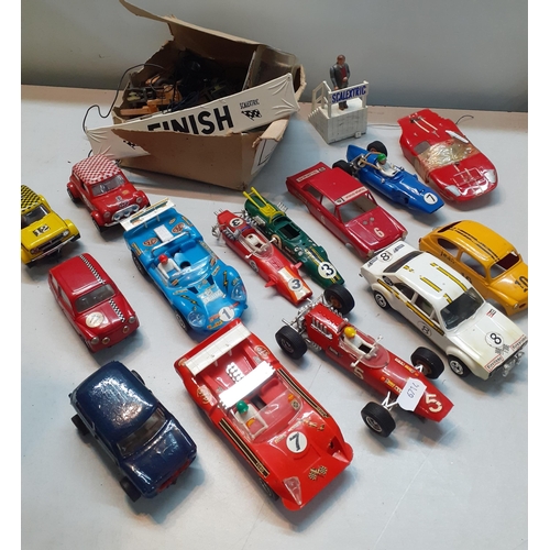 61 - Scalextric cars and accessories to include an Escort RS1600, a T C 600, buildings, track and other i... 