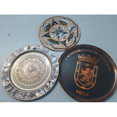 64 - Silver plate to include placemats, a tray, teaware and other items to include metal chargers, Locati... 