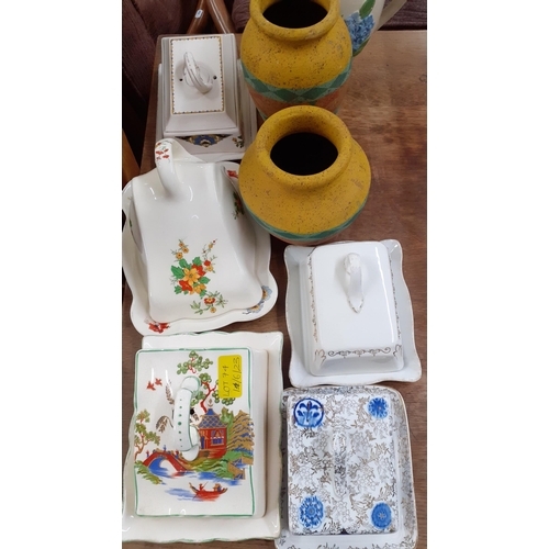 74 - A mixed lot to include a pair of Majolica planters A/F, vintage cheese dishes, dolls and a light dis... 