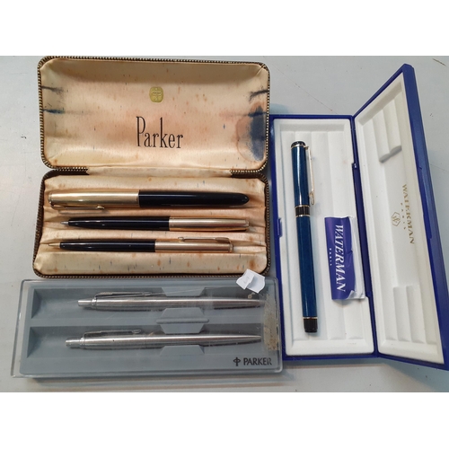 9 - Pens to include a set of three mid 20th century Parker fountain, ballpoint and a pencil cased, A/F, ... 