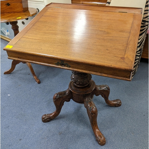 115 - A 19th century mahogany walnut and elm desk on a turned column and splayed legs Location:RAM