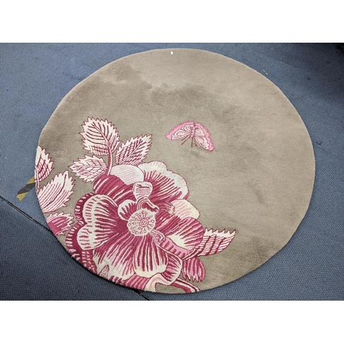 122 - A contemporary Sanderson circular rug decorated with a butterfly and flowers, 151cm d
Location:LWM