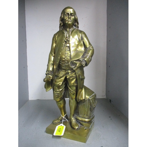 137 - An early 20th century statue of Benjamin Franklin with tricorn hat and scroll of paper, on a square ... 