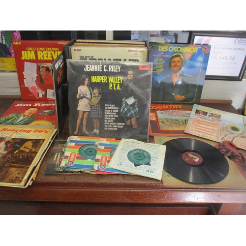 141 - A selection of easy listening and other LPs and singles to include Jeannie C Riley Harper Valley PTA... 