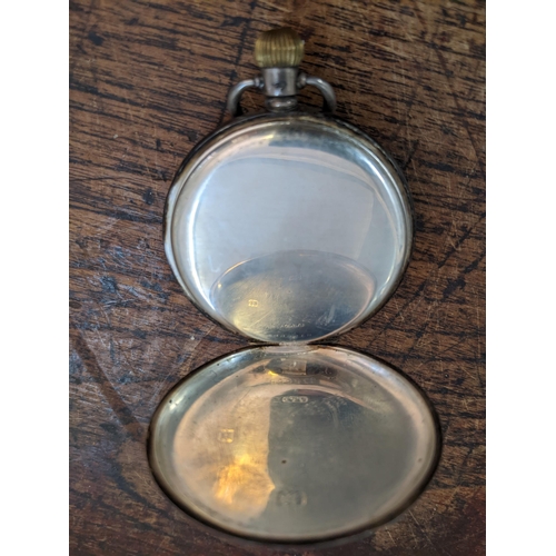 143 - An early 20th century manual-wind half-hunter pocket watch, in silver Dennison case, with blue ename... 