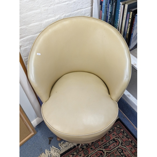 197 - An early 20th century cream leather upholstered bedroom chair
Location:RWF