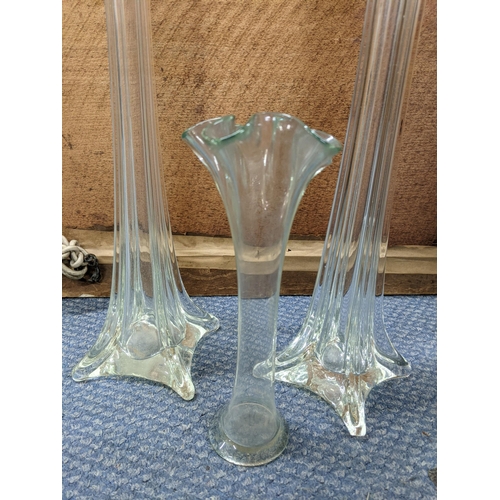 203 - A pair of early 20th century tall clear glass slender vases, and another
Location:RAB