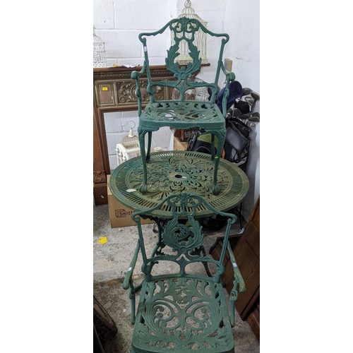 205 - A green painted aluminium garden table and two chairs
Location:G