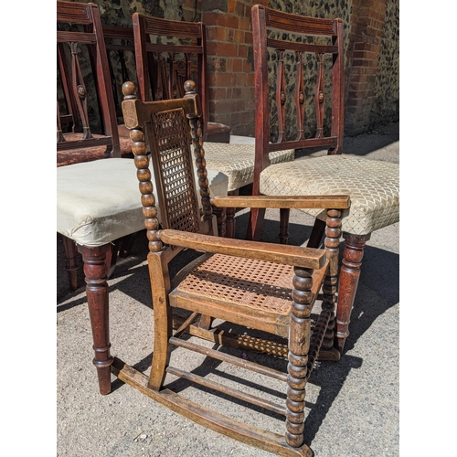 206 - A set of six 19th century mahogany dining chairs with carved splat backs, a child's rocking chair an... 