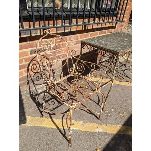 207 - A vintage wrought iron garden table with a marble top and a pair of matching chairs Location:FOYER