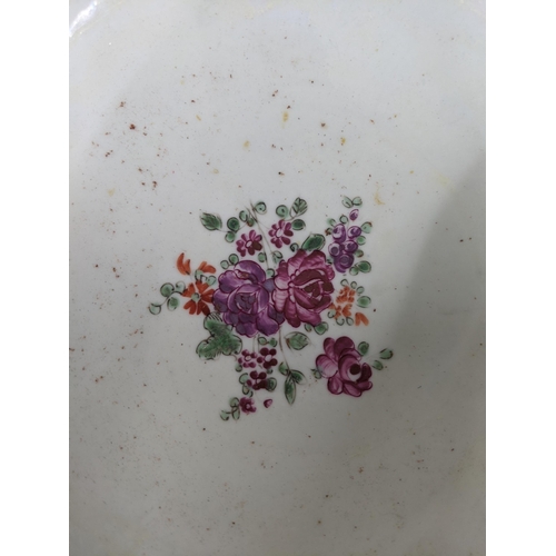 21 - A porcelain bowl in the design of an 18th century Chinese famille rose bowl Location:9.3