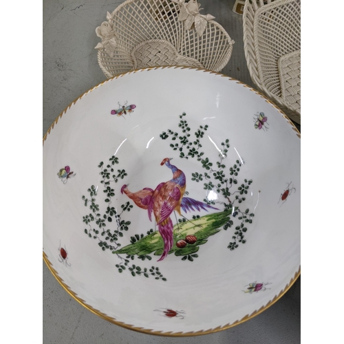 22 - Two Belleek  lattice pierced bowls, together with two porcelain bowls decorated with peacocks and in... 