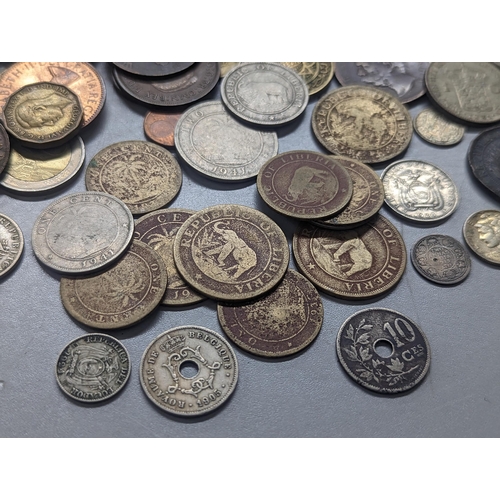 252 - Mixed world coins to include 1857 USA one-dime A/F, Mercury Dimes, 1913 Two Annas, 1891 Argentina Do... 