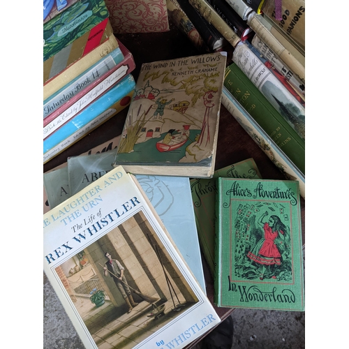 297 - A selection of books to include Kenneth Grahame, an early edition of 'The Wind in the Willows' 43rd ... 