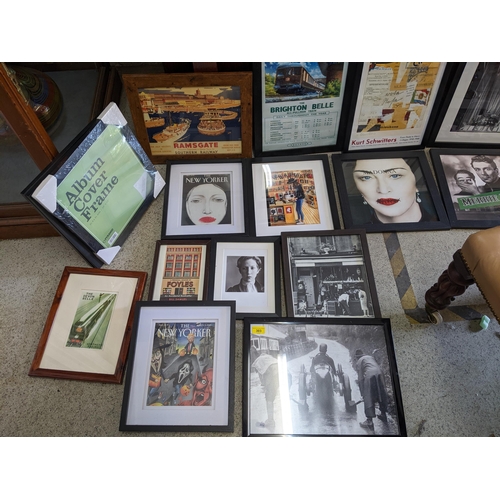 303 - A selection of framed and glazed reproduction train and travel posters, photographs, and New Yorker ... 