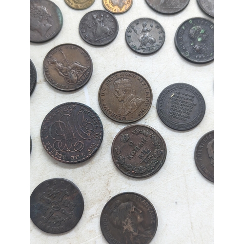 318 - A collection of George II and later coins and tokens to include 1858 Penny, 1854 Halfpenny, 1754 Far... 