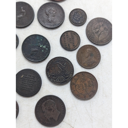 318 - A collection of George II and later coins and tokens to include 1858 Penny, 1854 Halfpenny, 1754 Far... 