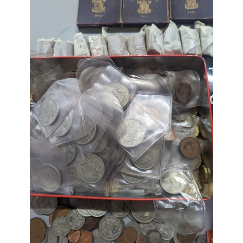 324 - A large quantity of British and world coinage to include Victorian and later pennies, 1960s tubes of... 