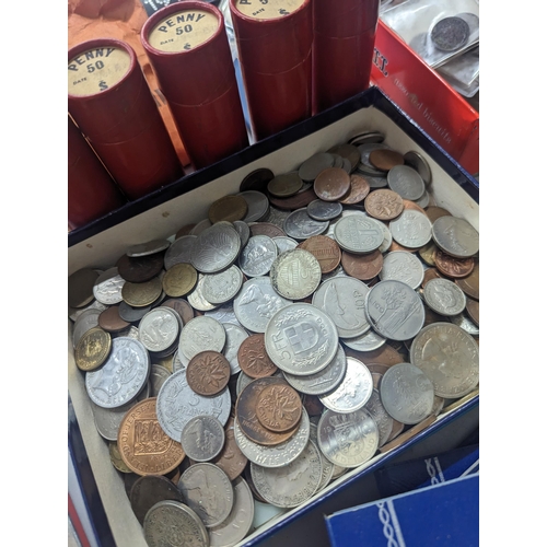 324 - A large quantity of British and world coinage to include Victorian and later pennies, 1960s tubes of... 