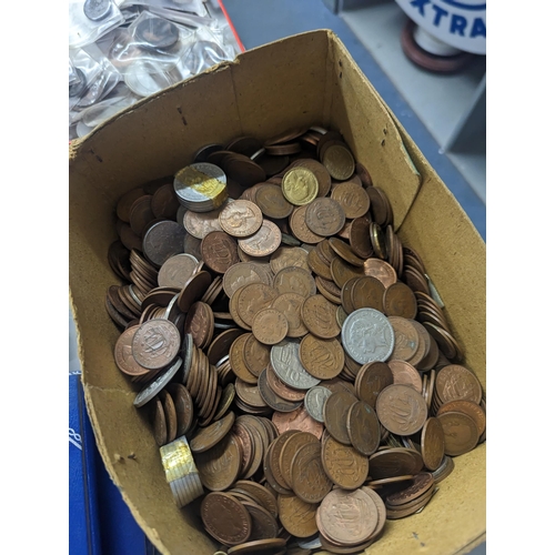 324 - A large quantity of British and world coinage to include Victorian and later pennies, 1960s tubes of... 