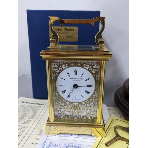 326 - Two clocks to include a boxed Hester-Clarke 8-day carriage clock, with receipts and guarantee
Locati... 