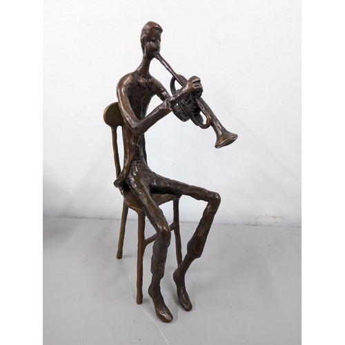 329 - Bernard Kim (B.1942) a patinated bronze sculpture of a man playing the trumpet
Location:8.1