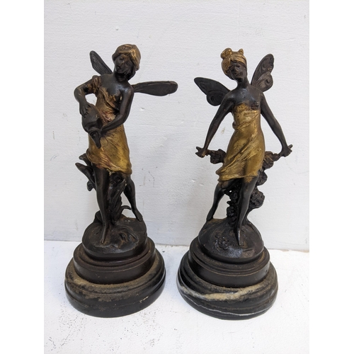 339 - A pir of bronze water nymphs, signed, on a marble base with gilding, 9 inches high
Location:R2.1