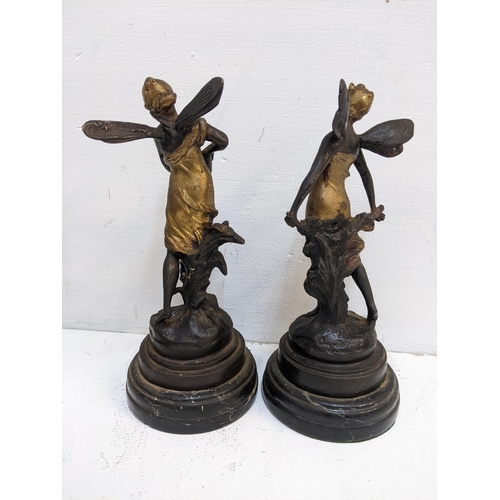 339 - A pir of bronze water nymphs, signed, on a marble base with gilding, 9 inches high
Location:R2.1