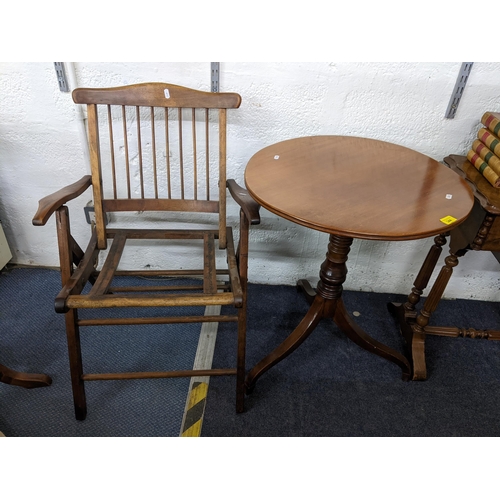 344 - An early 19th century mahogany occasional table having a turned column and on splayed legs, 69cm h x... 