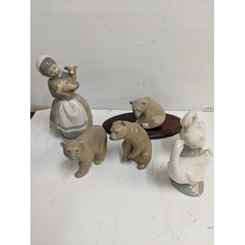 359 - Spanish ceramics to include three Lladro model bears, Nao geese and others
Location:R2.4