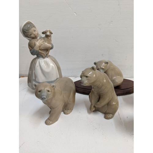 359 - Spanish ceramics to include three Lladro model bears, Nao geese and others
Location:R2.4