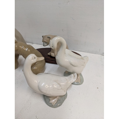 359 - Spanish ceramics to include three Lladro model bears, Nao geese and others
Location:R2.4