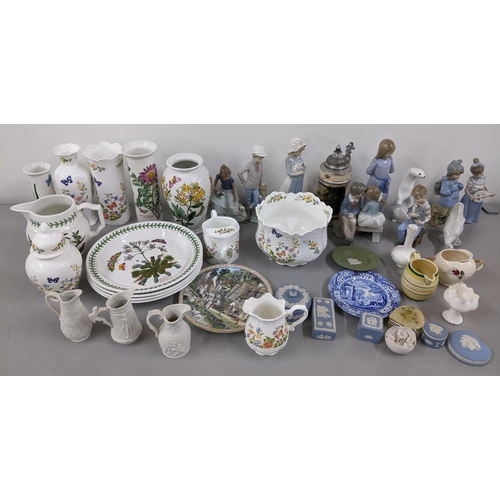 369 - A mixed lot to include Nao figures, Wedgwood Jasperware, Parian jugs, Portmeirion Botanic Garden and... 