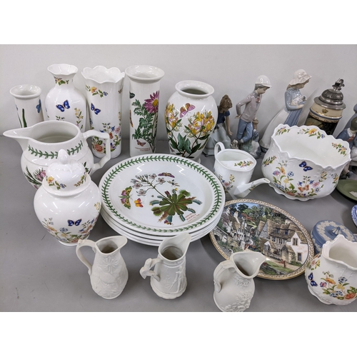 369 - A mixed lot to include Nao figures, Wedgwood Jasperware, Parian jugs, Portmeirion Botanic Garden and... 