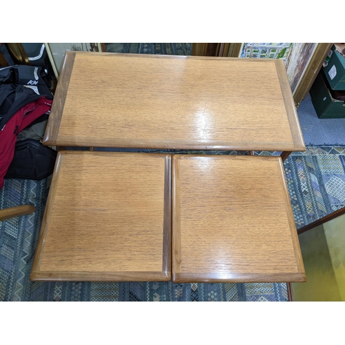 371 - A retro G-plan teak coffee table with two nests of tables underneath, 51cm h x 98.5cm w
Location:A3M