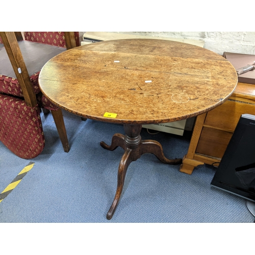 38 - A Georgian oak snap top occasional table on three splayed legs, 71h x 82w, Location:LAM