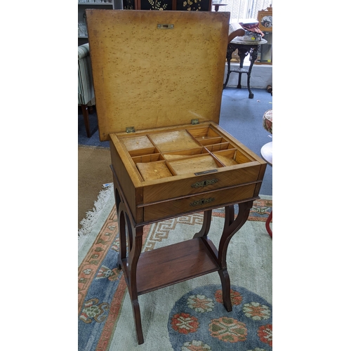 79 - A 19th century French work table having a hinged top, two drawers and shelf below, 77h x 49.5w, Loca... 