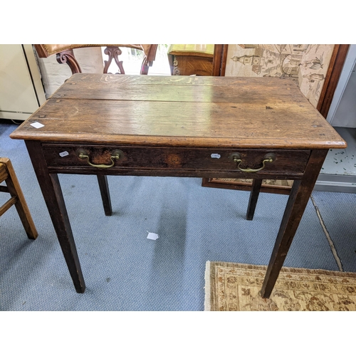 89 - An 18th century oak side table having a single drawer and on square legs, 75.5h x 85w, Location:RWB