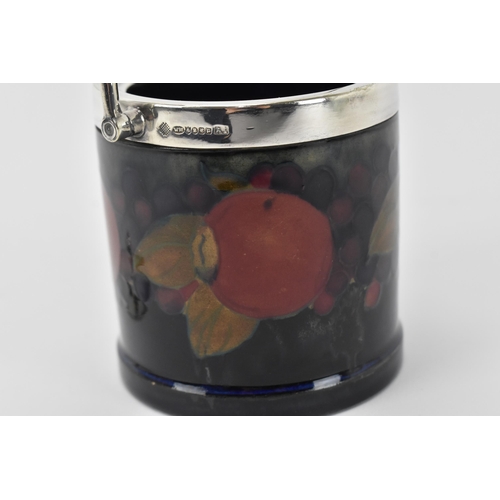 31 - A Moocroft pottery preserve pot by Walter Moorcroft (1917-2002), with silver-plated mount, lid and s... 