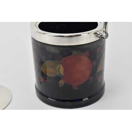 31 - A Moocroft pottery preserve pot by Walter Moorcroft (1917-2002), with silver-plated mount, lid and s... 