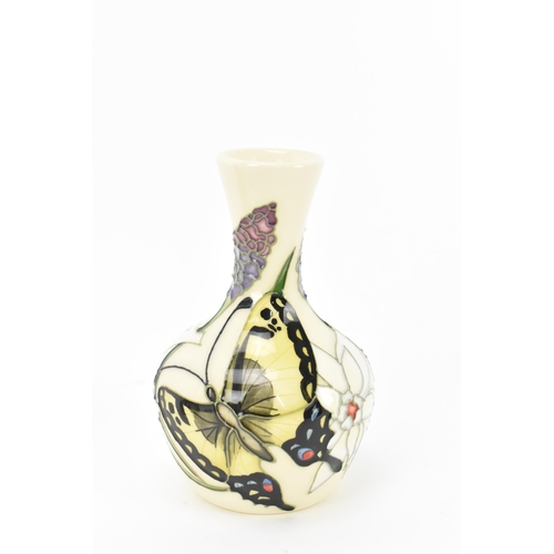 34 - Two Modern Moorcroft pottery bud vases, one in the 'pole to pole rabbits' pattern designed by Kerry ... 