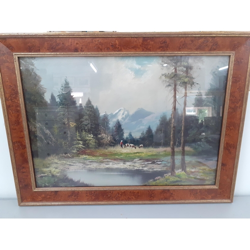 279 - A German oil painting a figure and cows in a forest landscape, indistinctly signed, in a walnut fram... 