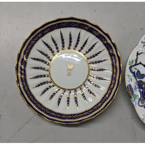 217 - A Derby dish with blue and gilt ornament and a Tobacco leaf pattern plate
Location:5.4