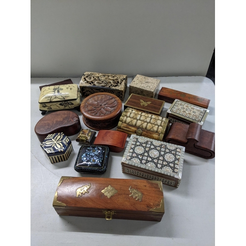 223 - A collection of mixed boxes to include a Vietnam soapstone box, camel bone boxes and others
Location... 