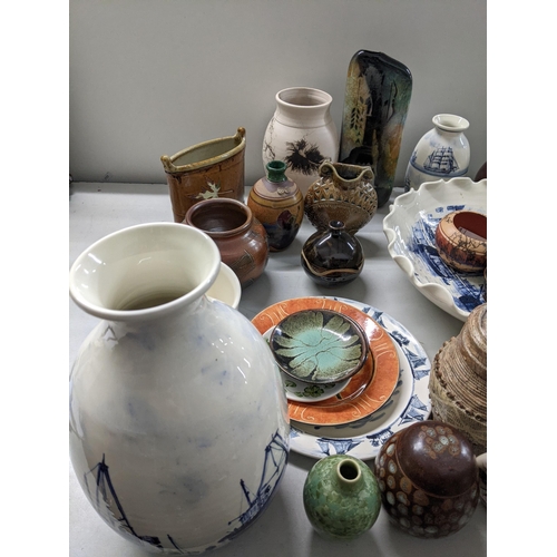 225 - A mixed lot of pottery to include a blue and white Rye bowl, Rye vases, together with mixed studio p... 