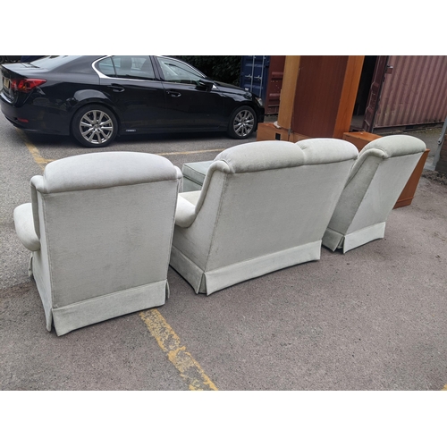 285 - A G-plan two seater sofa in faded green, two armchairs and a pair of matching footstools
Location:RE... 