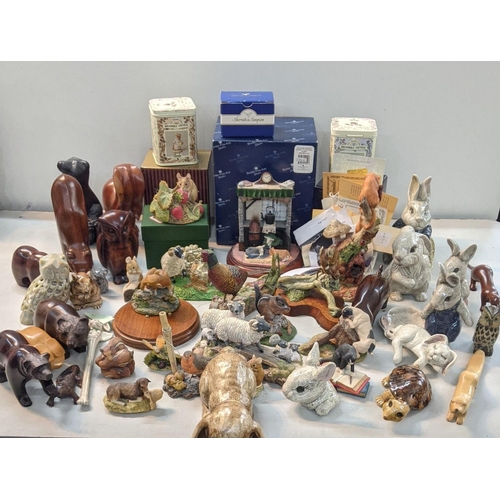 332 - A mixed lot to include Brambly Hedges border fine arts, a soap stone owl, porcelain rabbits, treen c... 