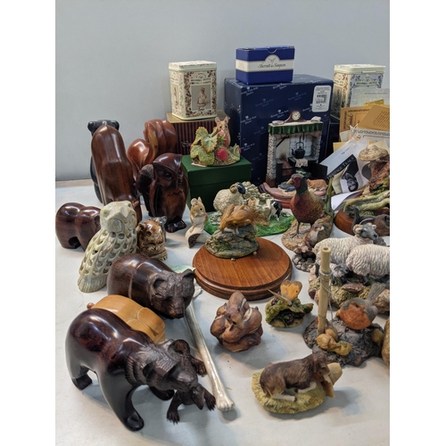 332 - A mixed lot to include Brambly Hedges border fine arts, a soap stone owl, porcelain rabbits, treen c... 