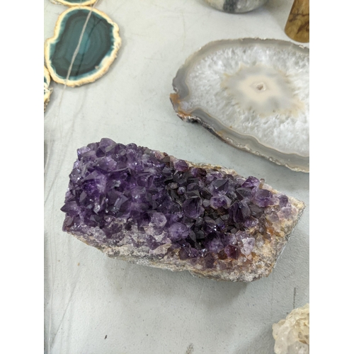 355 - A mixed lot to include a small amethyst crystal cluster, a pyrite crystal, agate wind chime, agate b... 