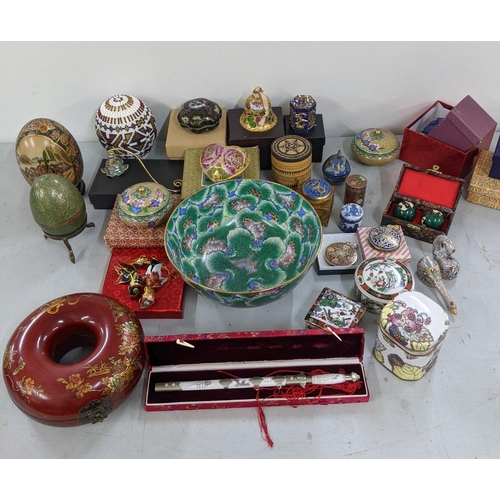 356 - A mixed lot of Oriental items to include Chinese worry balls, cloisonne, bell trinket boxes, ducks a... 